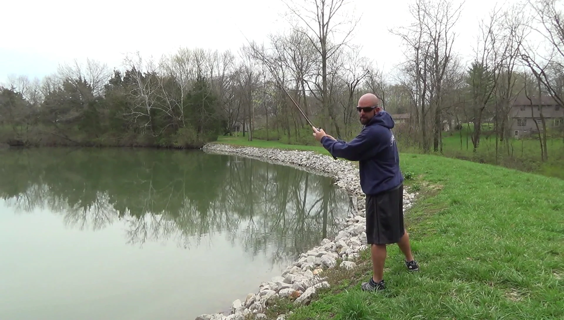 Angler casting with the reel