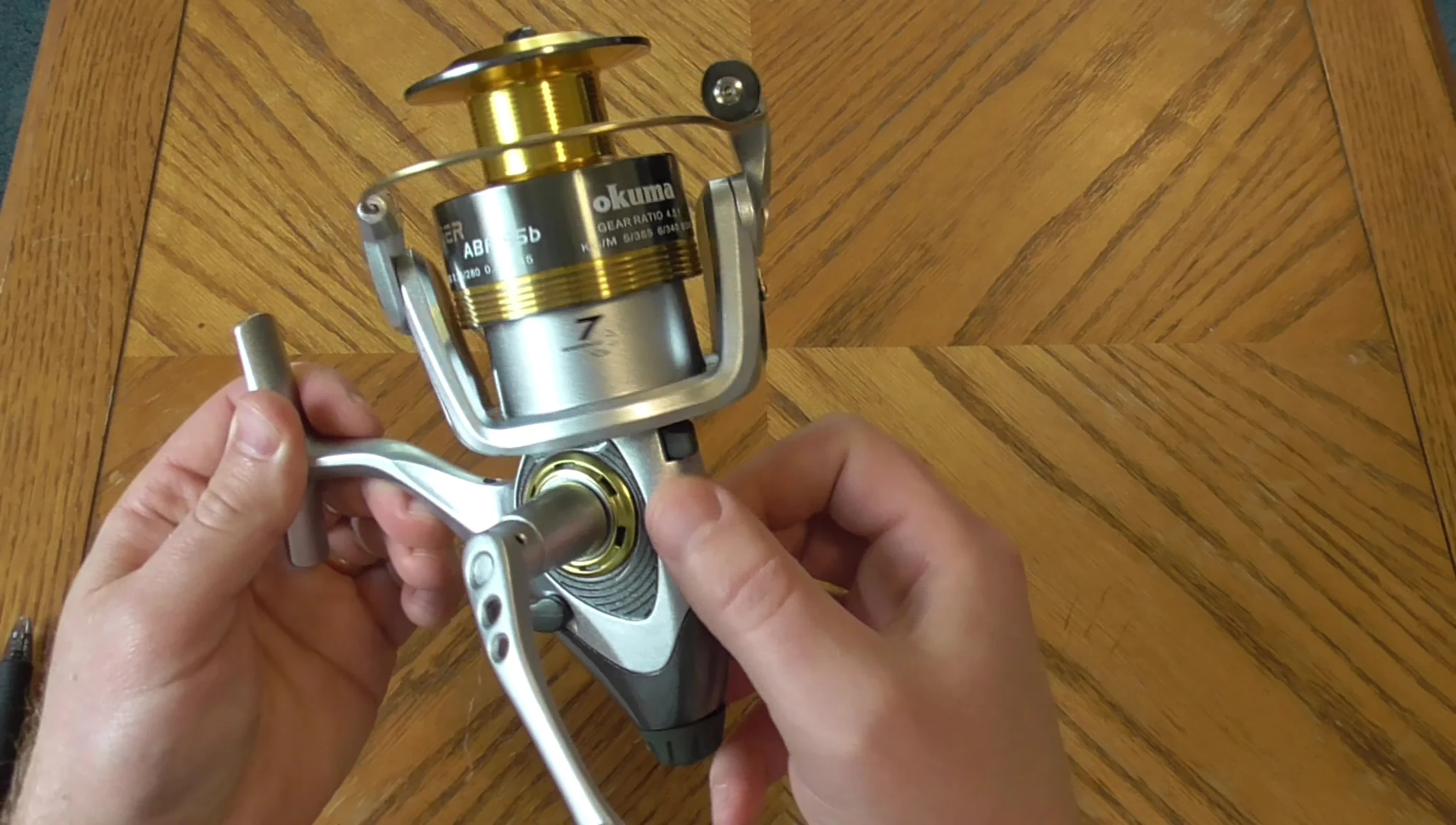 Close-up of the reel's graphite body and aluminum components