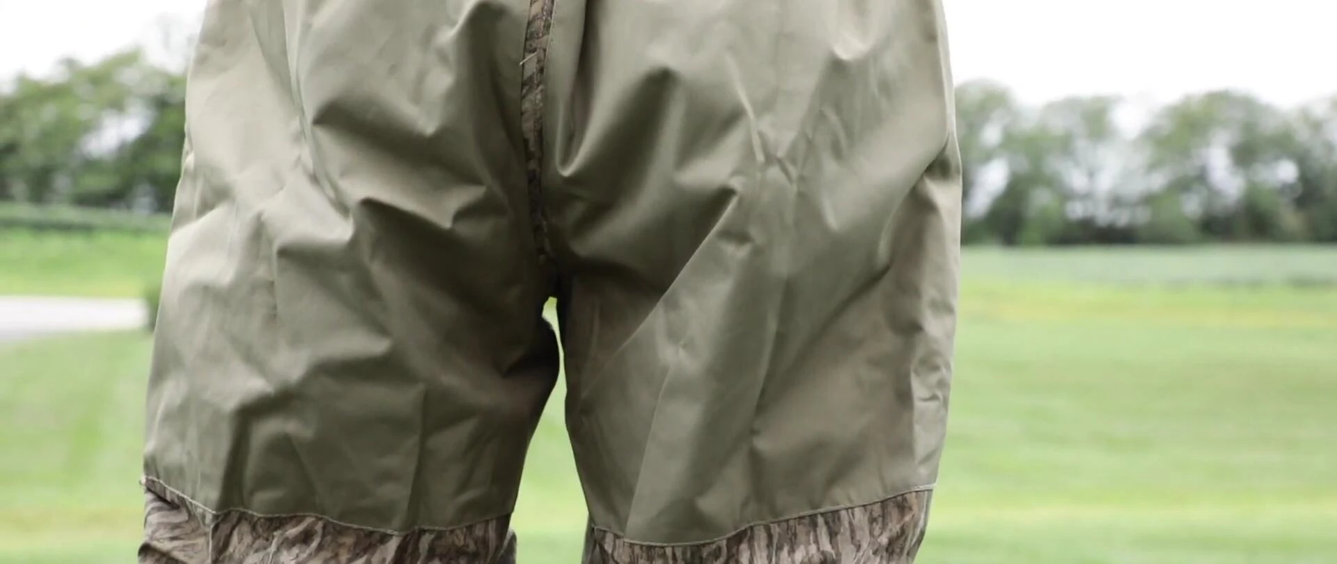 Person modeling the waders in action