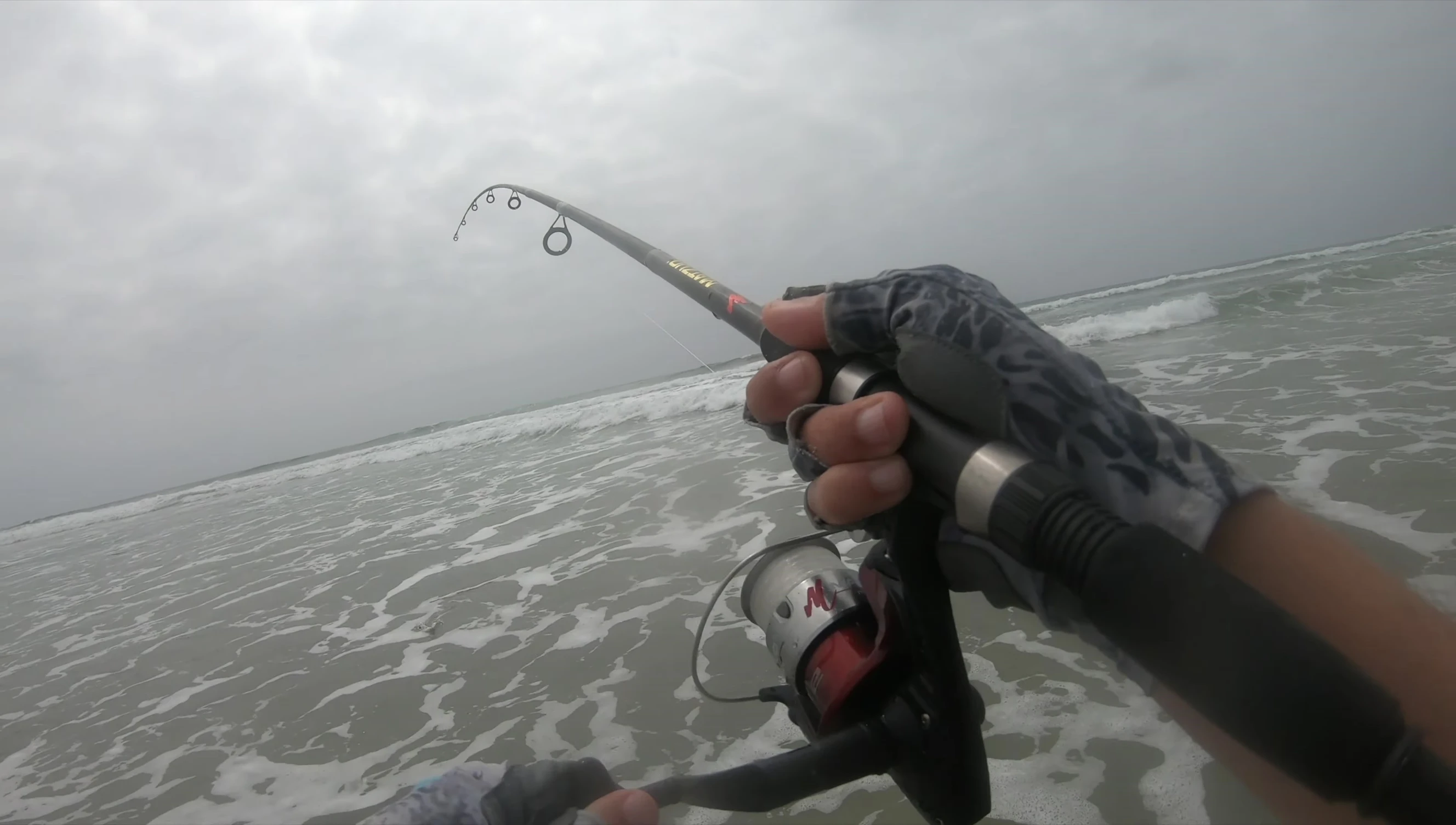 The speaker showing his catch.