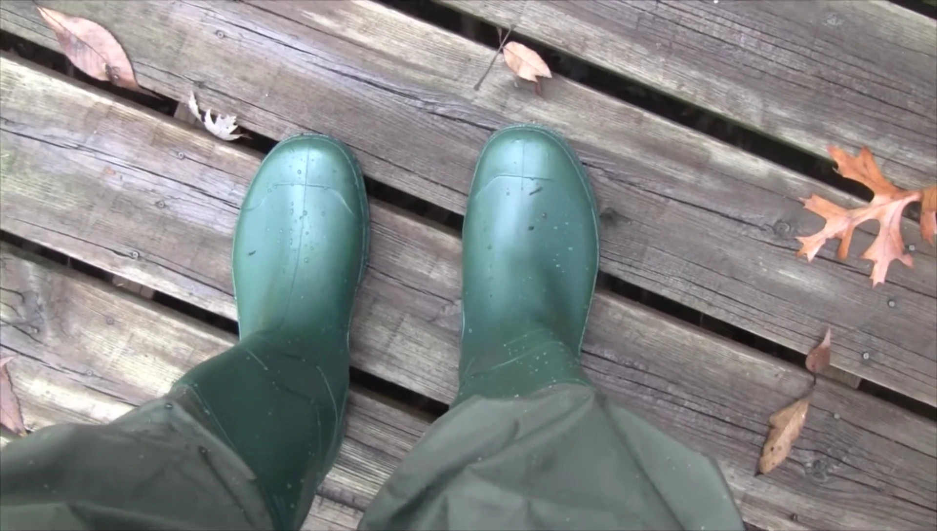 Demonstrating the waterproofness of the waders after lake test