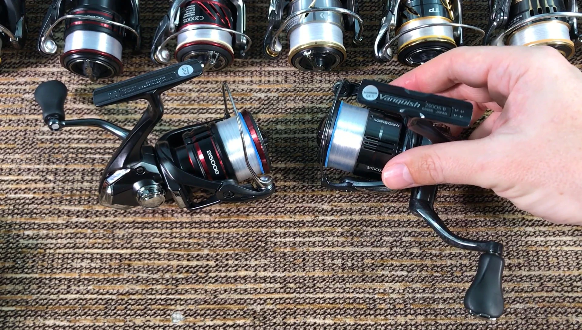 Close-up of the reels, emphasizing the differences in drag sound.
