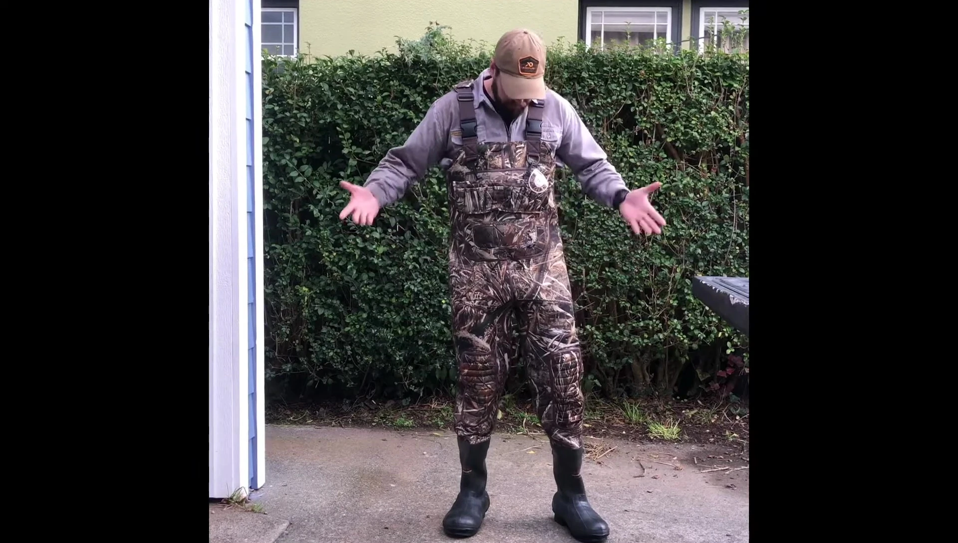 Reviewer showing how easy the waders are to put on.