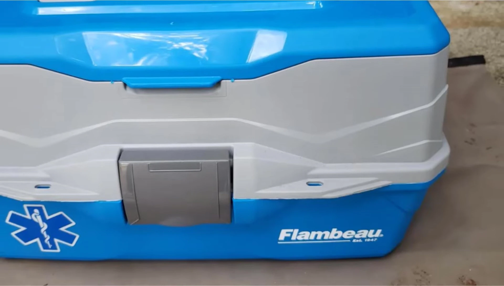 The Flambeau 6382 TB tackle box open, showcasing its storage capacity and organization.