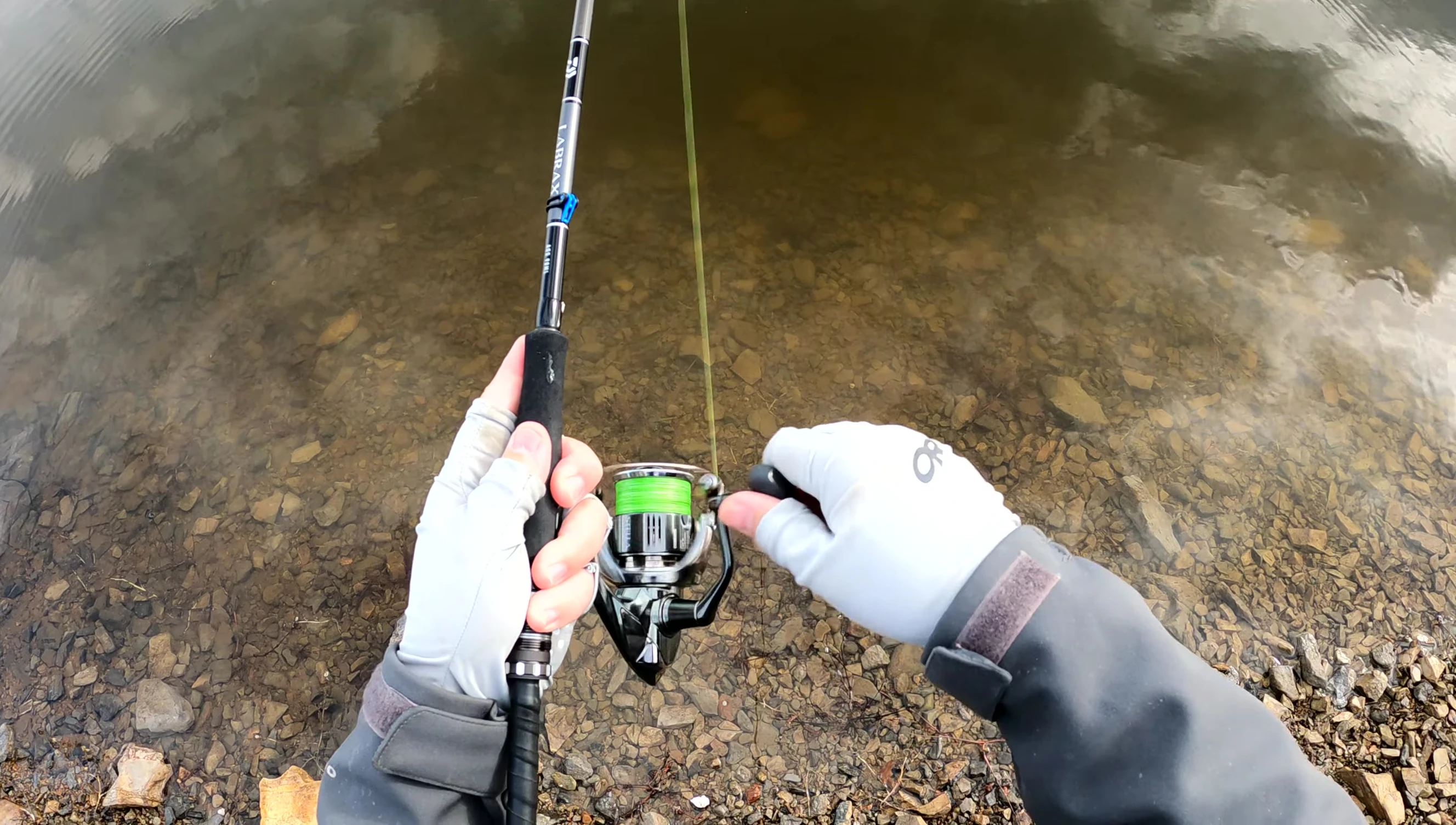 The reviewer holding the Shimano Stella reel.