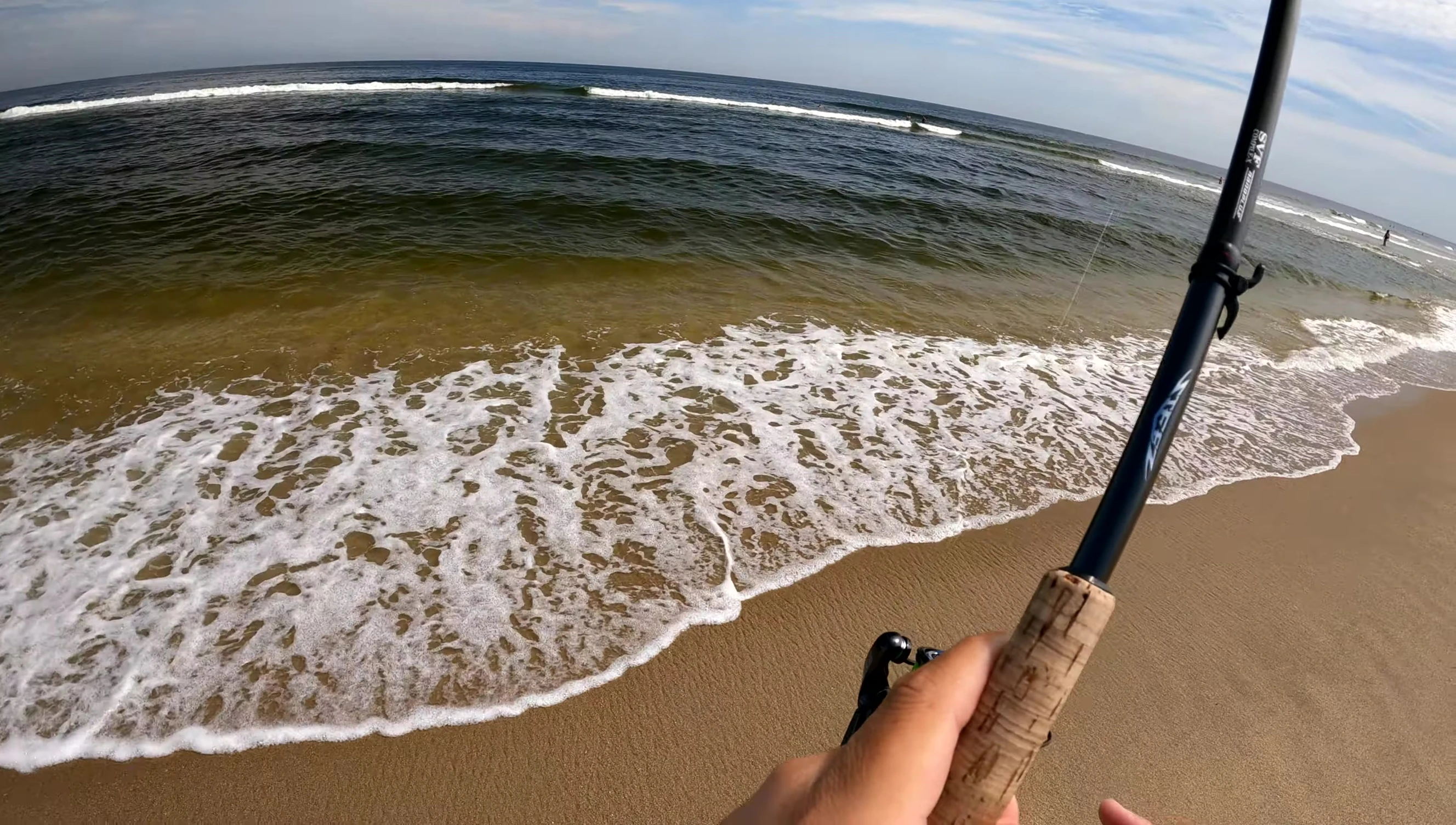 A smaller fish being reeled in smoothly.