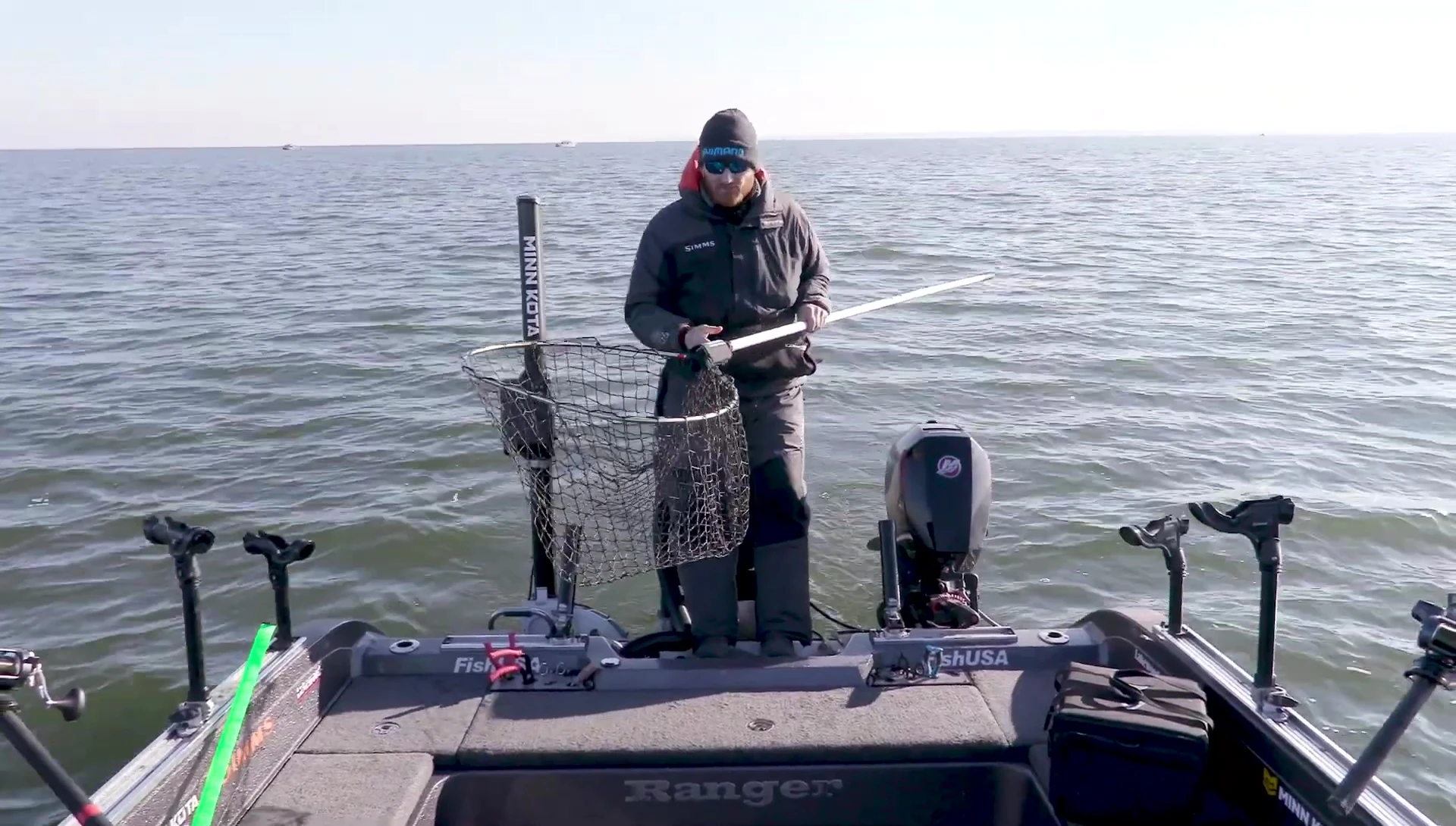 Angler highlighting the large size of the net