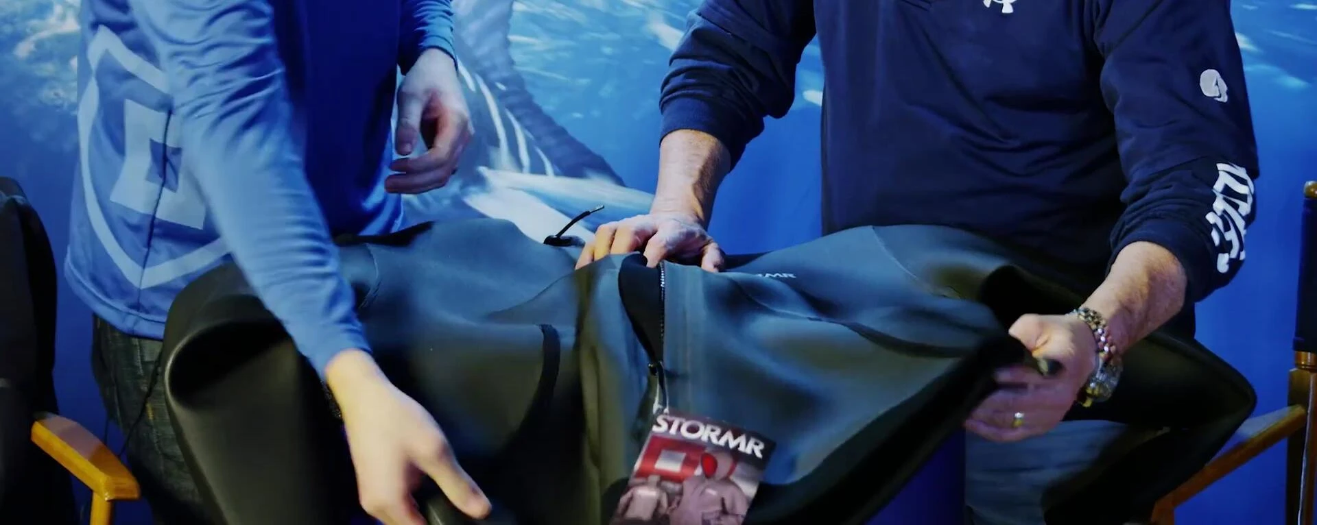 Close-up of the hoodie's hood and pockets, showing drainage