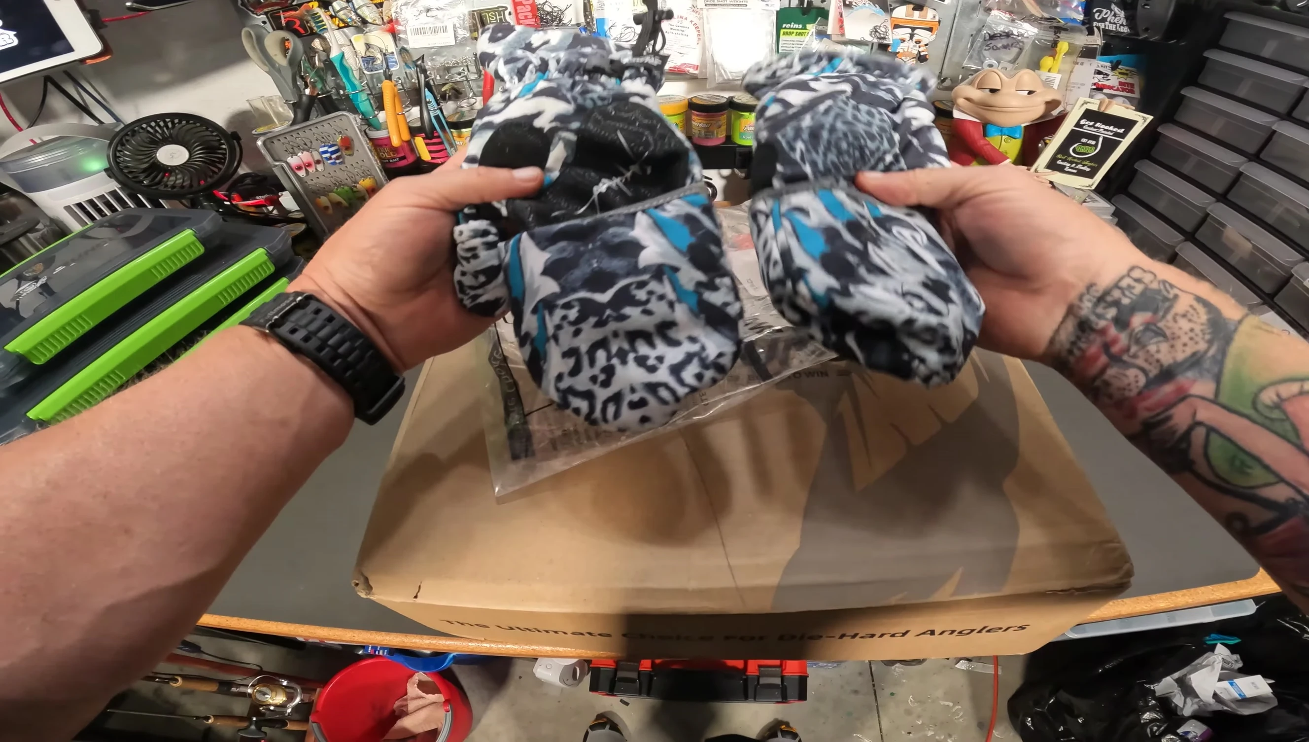 Close-up of the Jayclaw gloves showing the textured palms and mitten-style cuff.