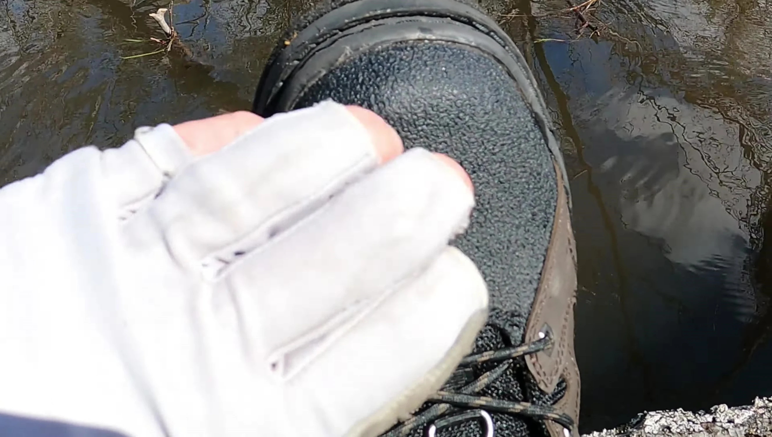 Close-up view of the reinforced toe cap of the Deep Eddy wading boot.