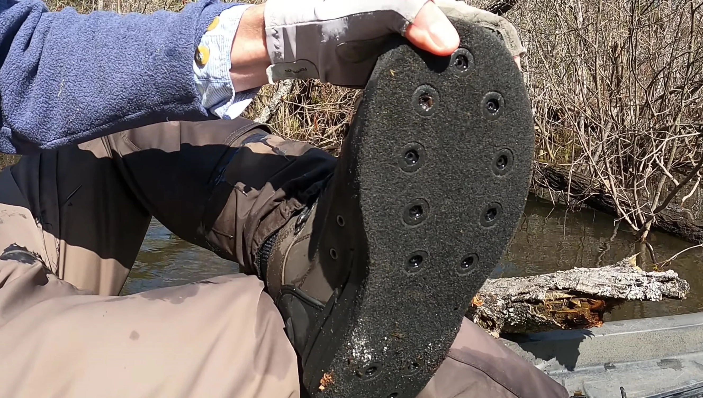 Shot of the felt sole of the boot, highlighting its condition after extended use.