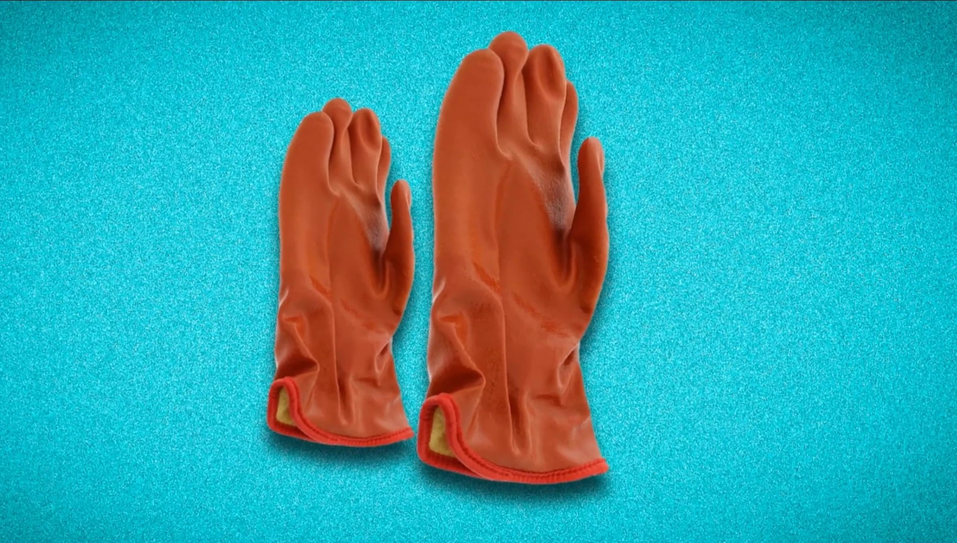 Close-up on the Showa gloves emphasizing the textured surface for better grip.