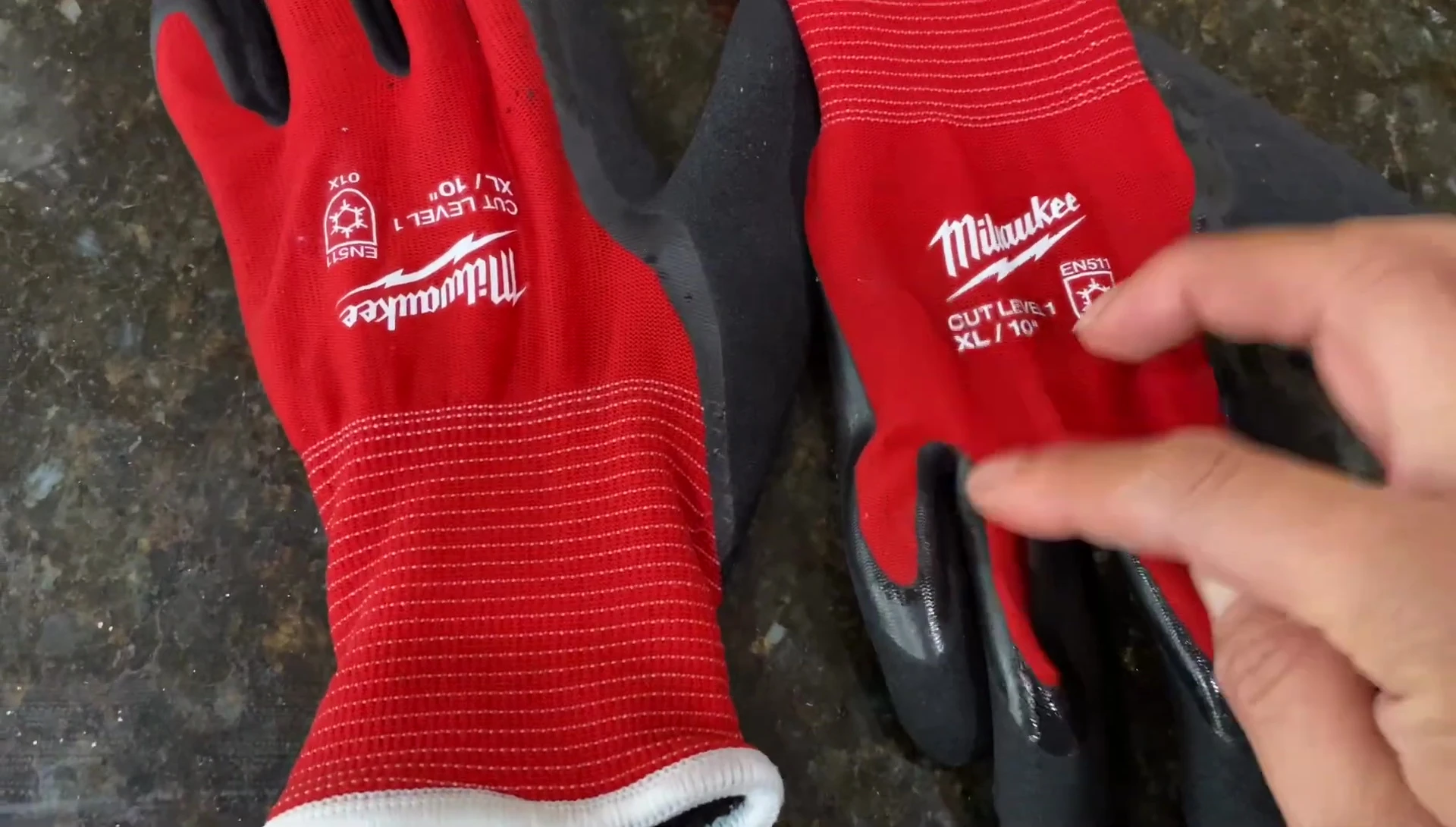 Gloves showcasing waterproof and insulated areas.