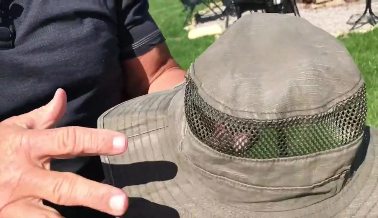 The speaker wearing the wet hat.