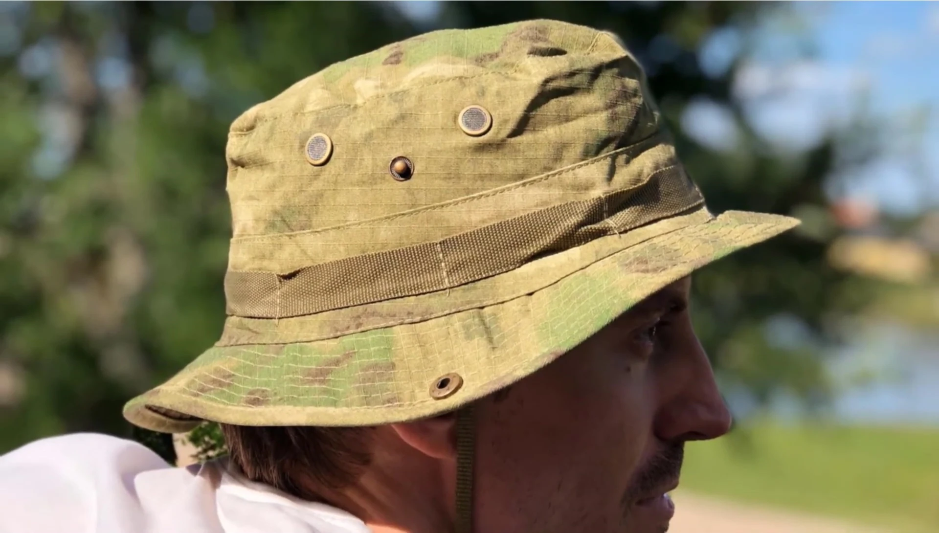The hat showing the adjustable side closures
