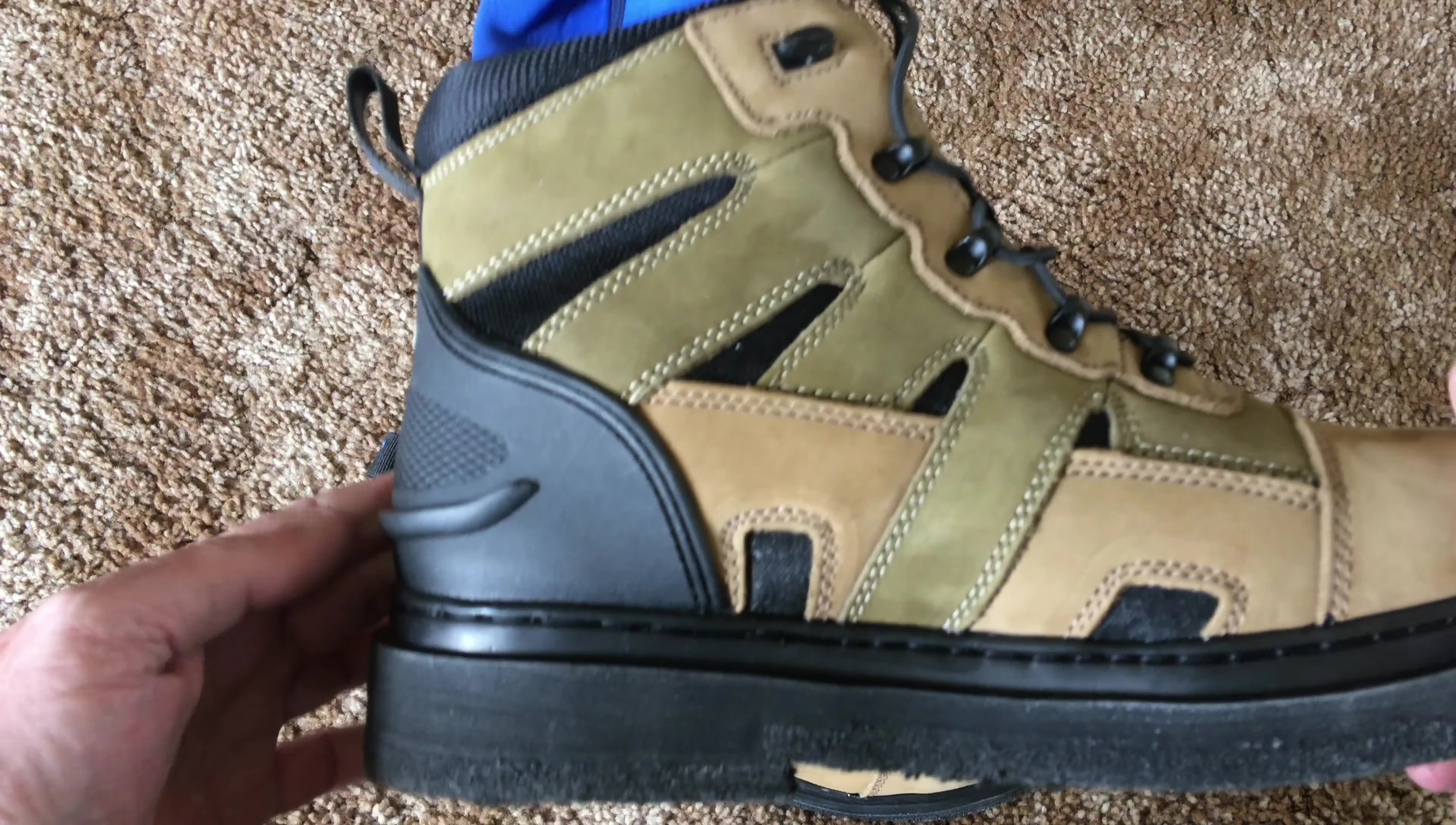 View of the kick plate and sole stitching
