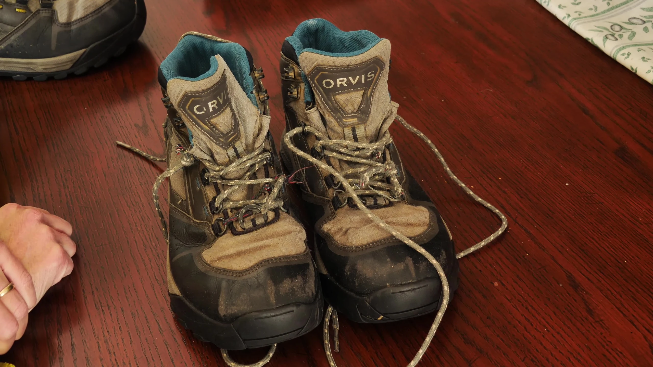 The boots drying in the sun.