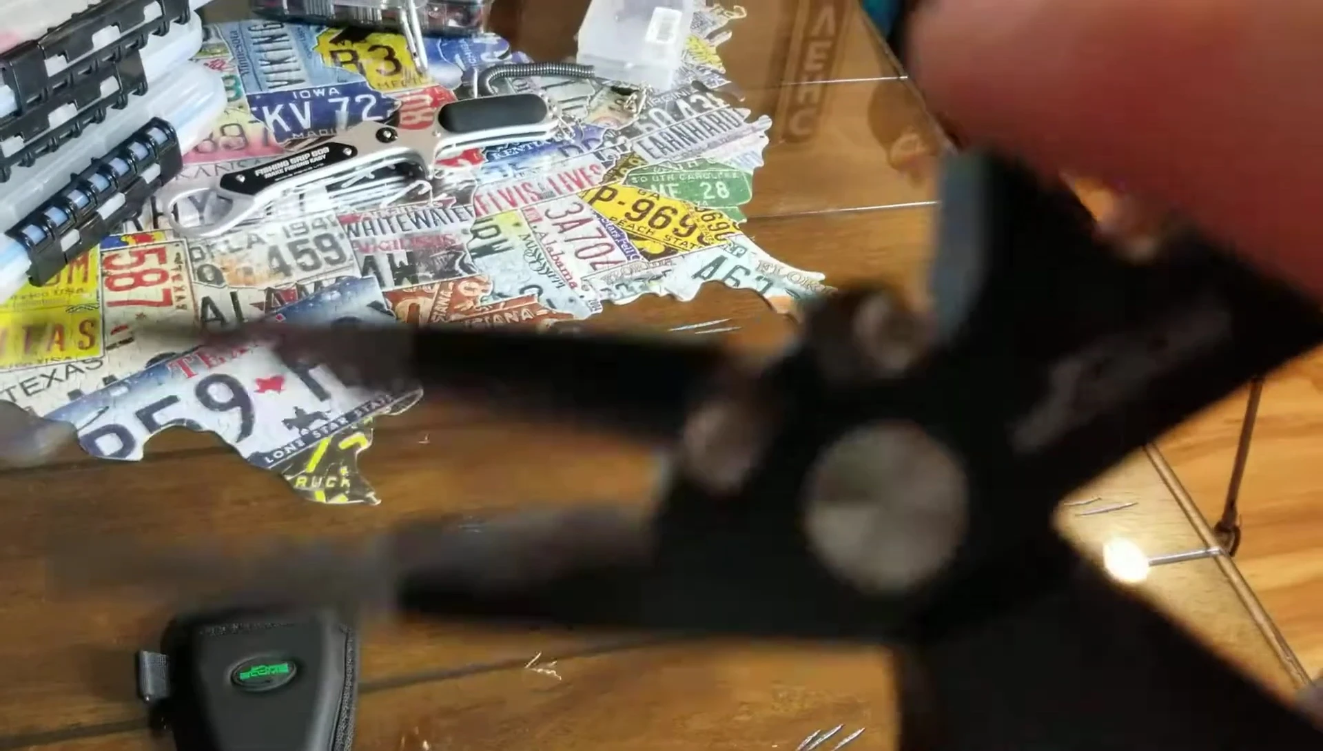 The line cutter on the pliers.