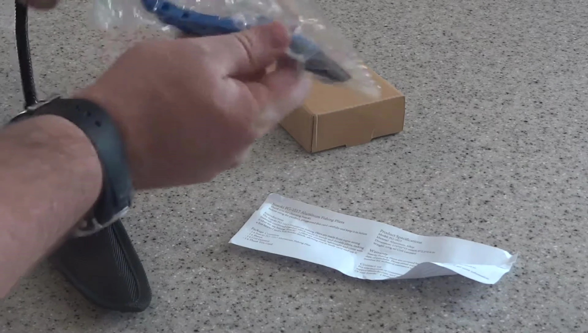 Pliers attached to the case with lanyard