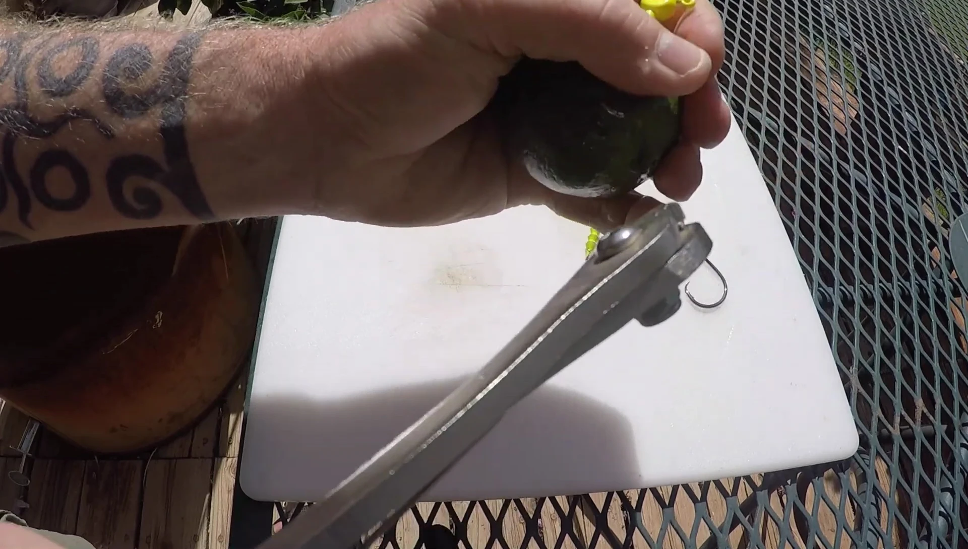 The hook cutter cutting a hook