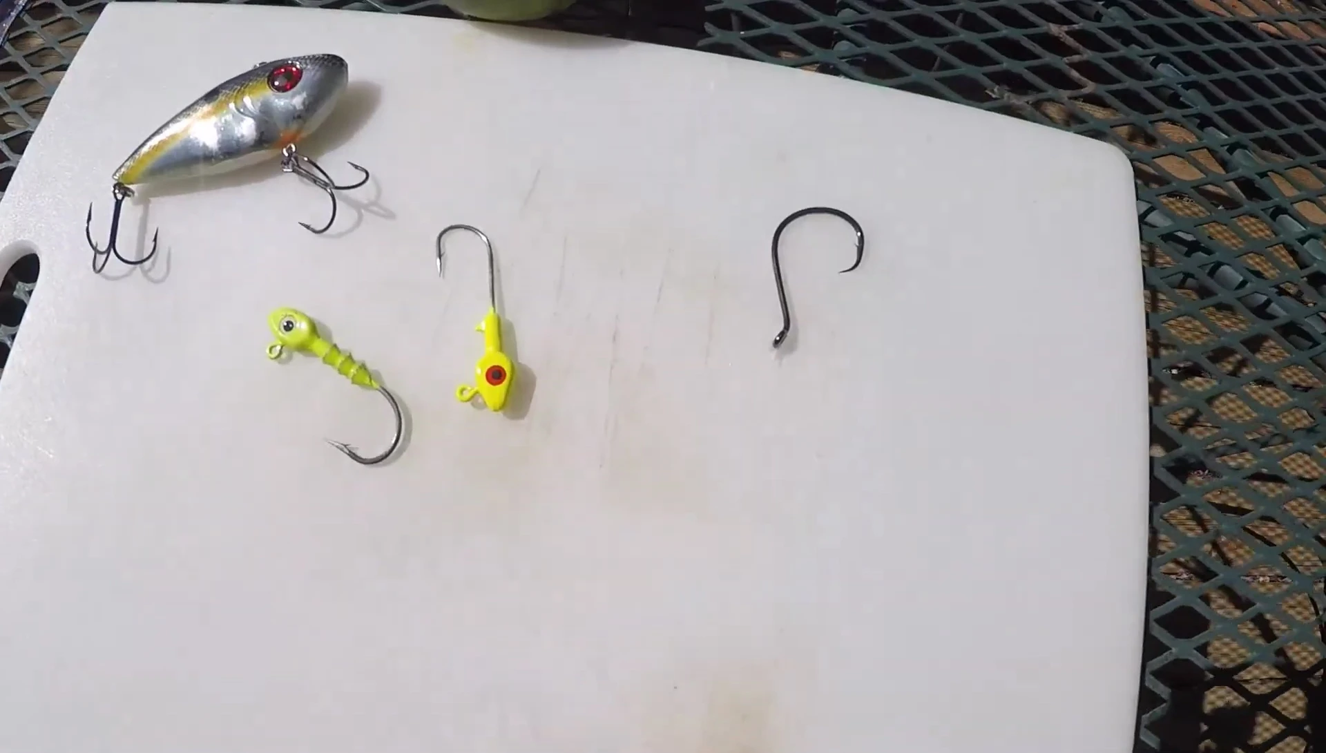 Treble hook and jig heads shown