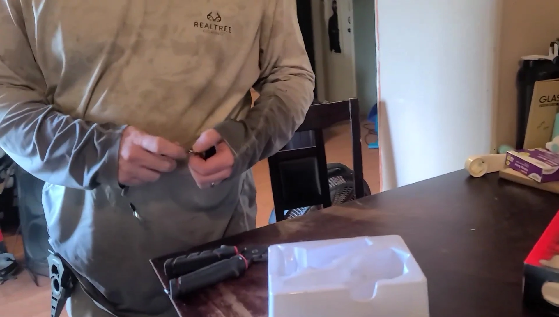 Demonstration of using the carabiner clip.