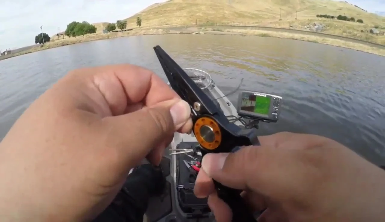 The pliers cleanly cutting through multiple layers of 50-pound braid.