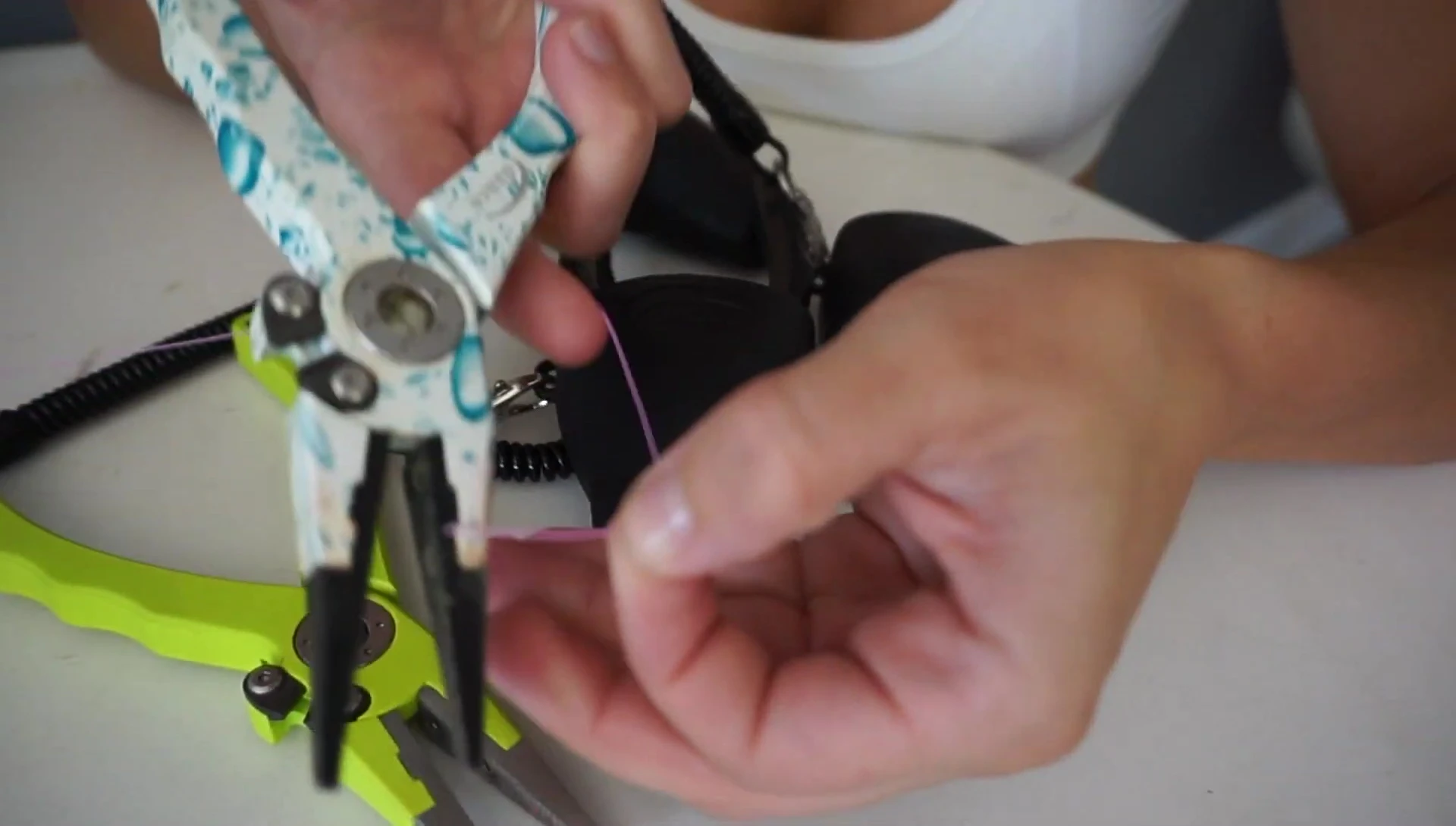 Close-up showcasing the clean cut from the aluminum pliers.