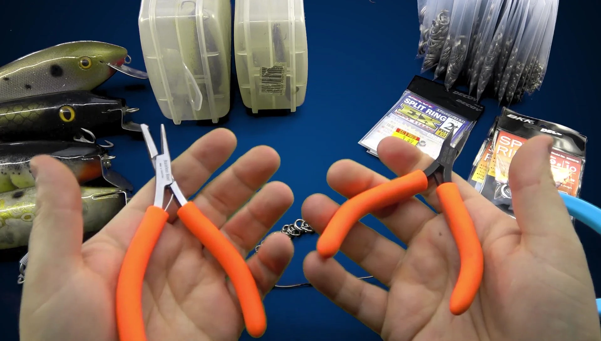 Hand comparison of the weight difference between the old and new pliers.