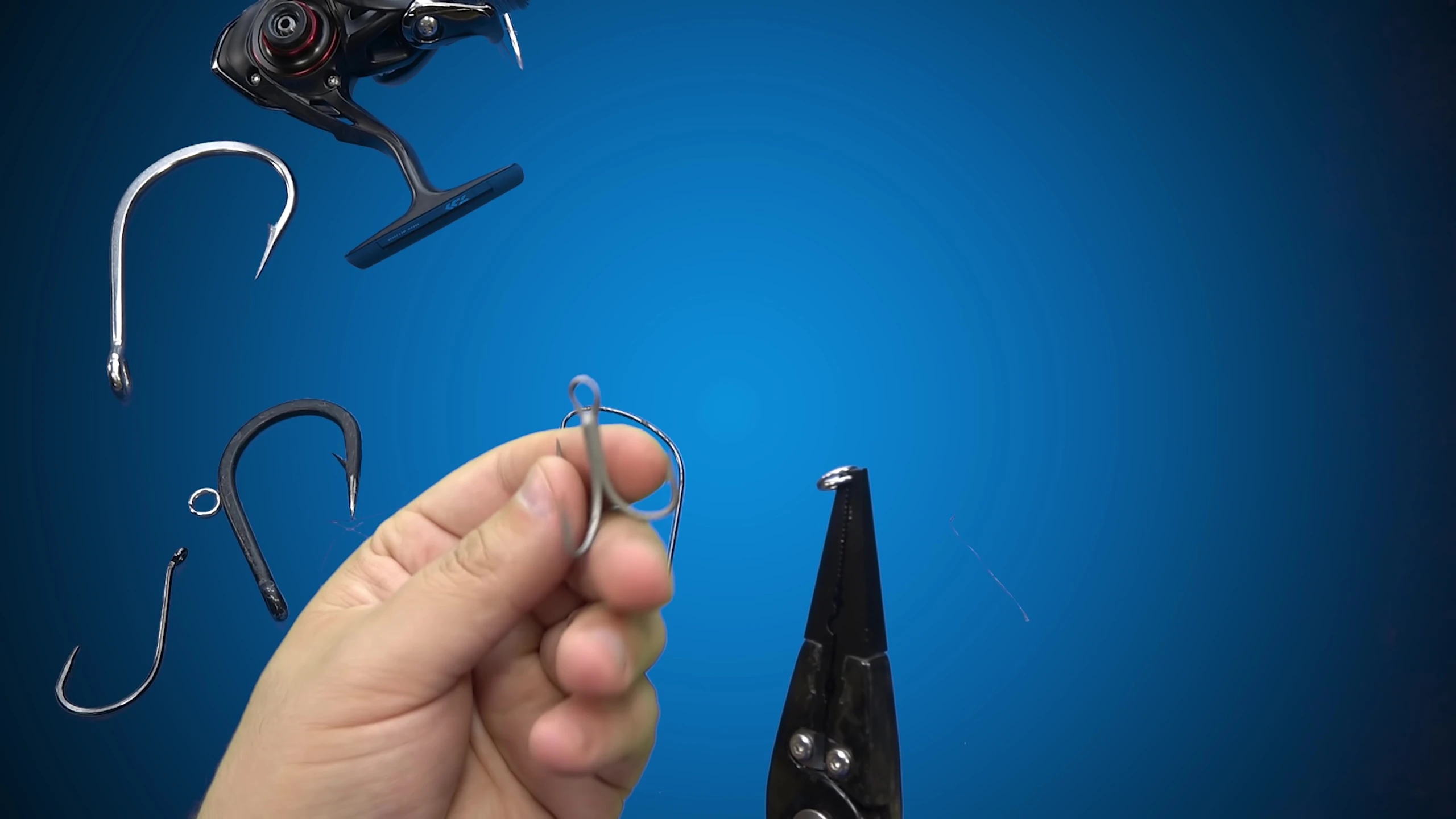 The reviewer using the Sand-Like pliers on a split ring.