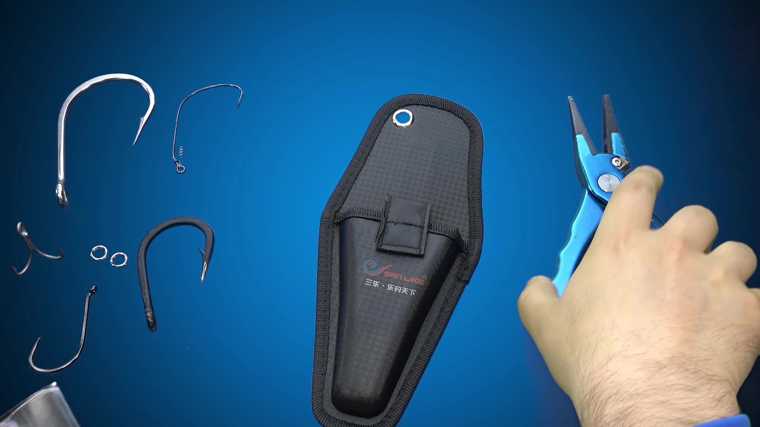 The reviewer displays the P-Line Adoro pliers.