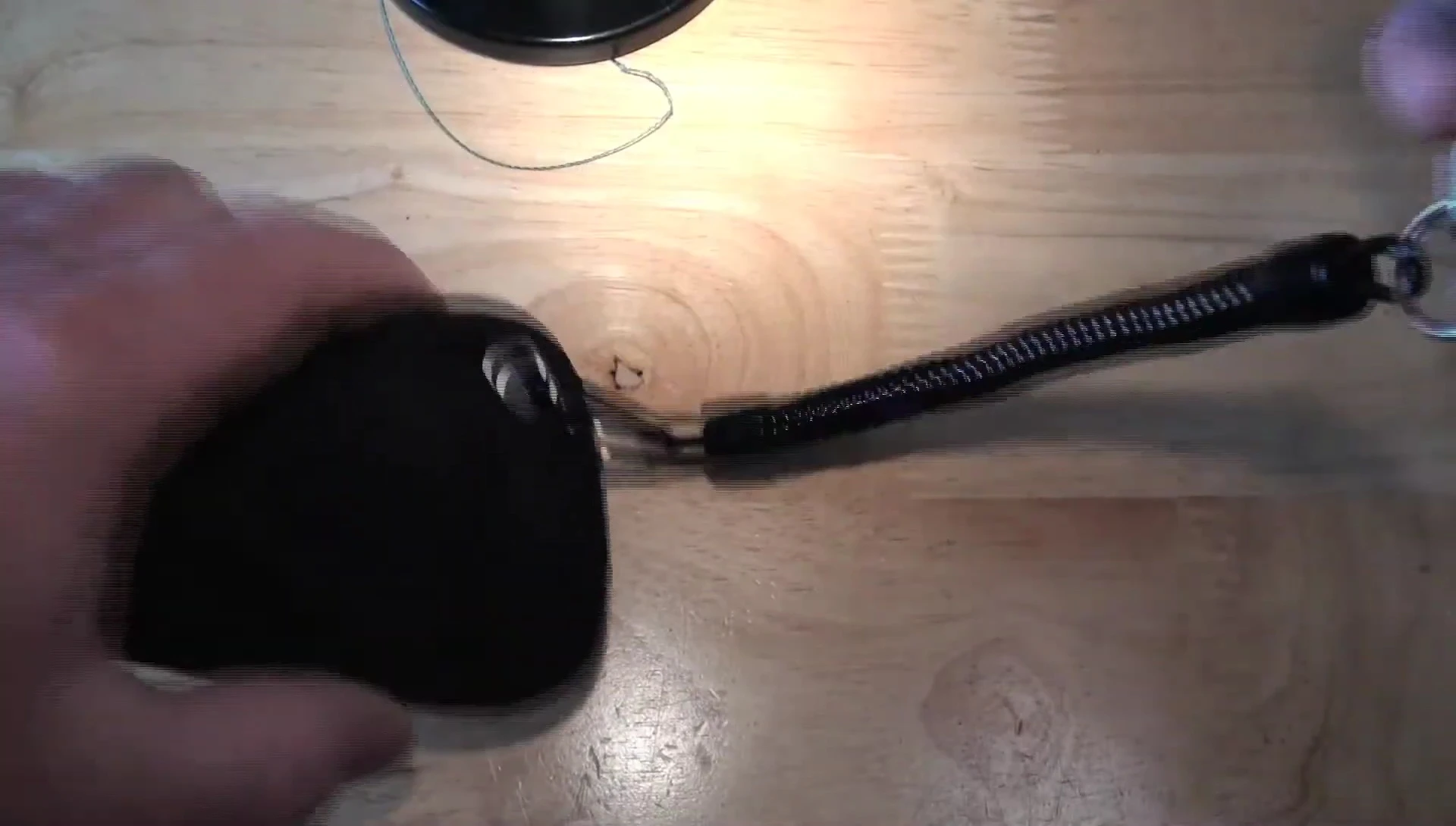 The pliers with their included holster and lanyard.