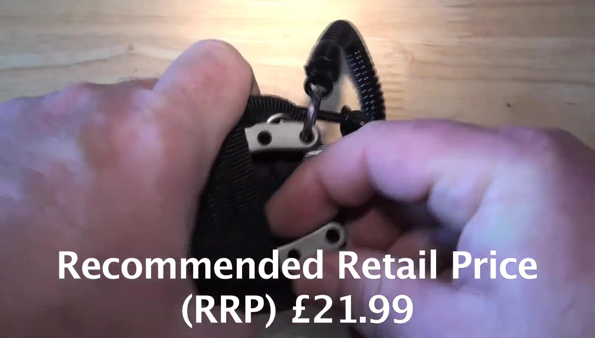 Close-up of the Snowbee pliers showcasing their compact size next to a ruler