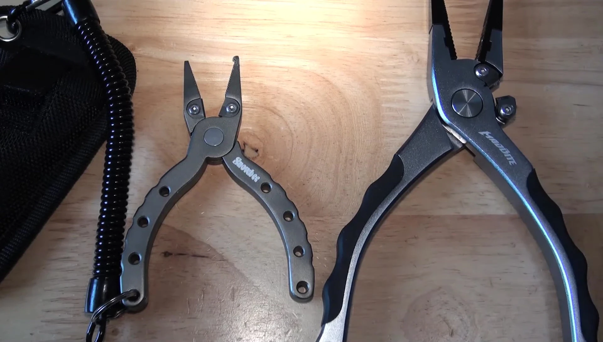 Comparison shot of the Snowbee pliers next to a larger pair of pliers