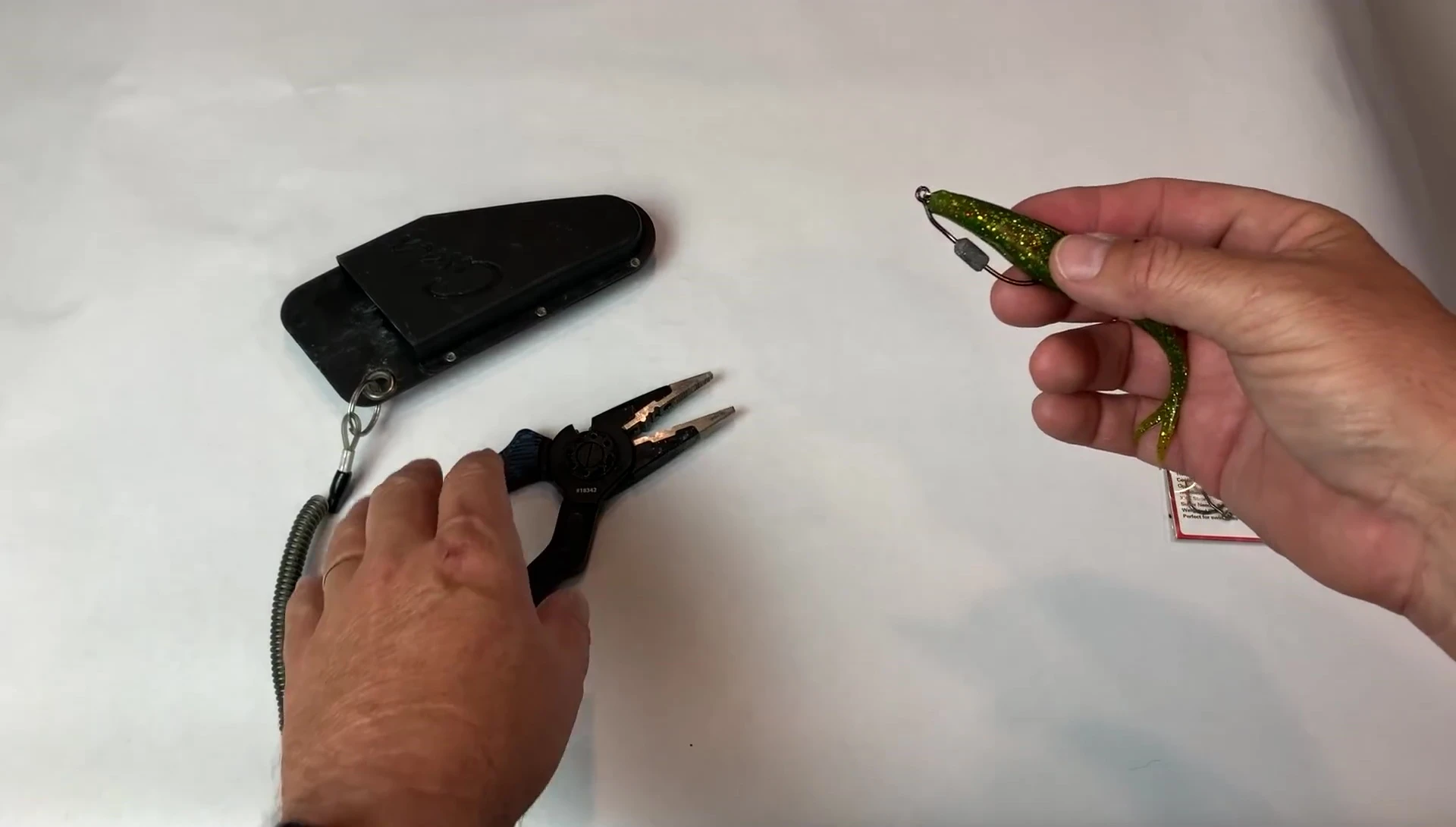 Removing the weight from the hook.