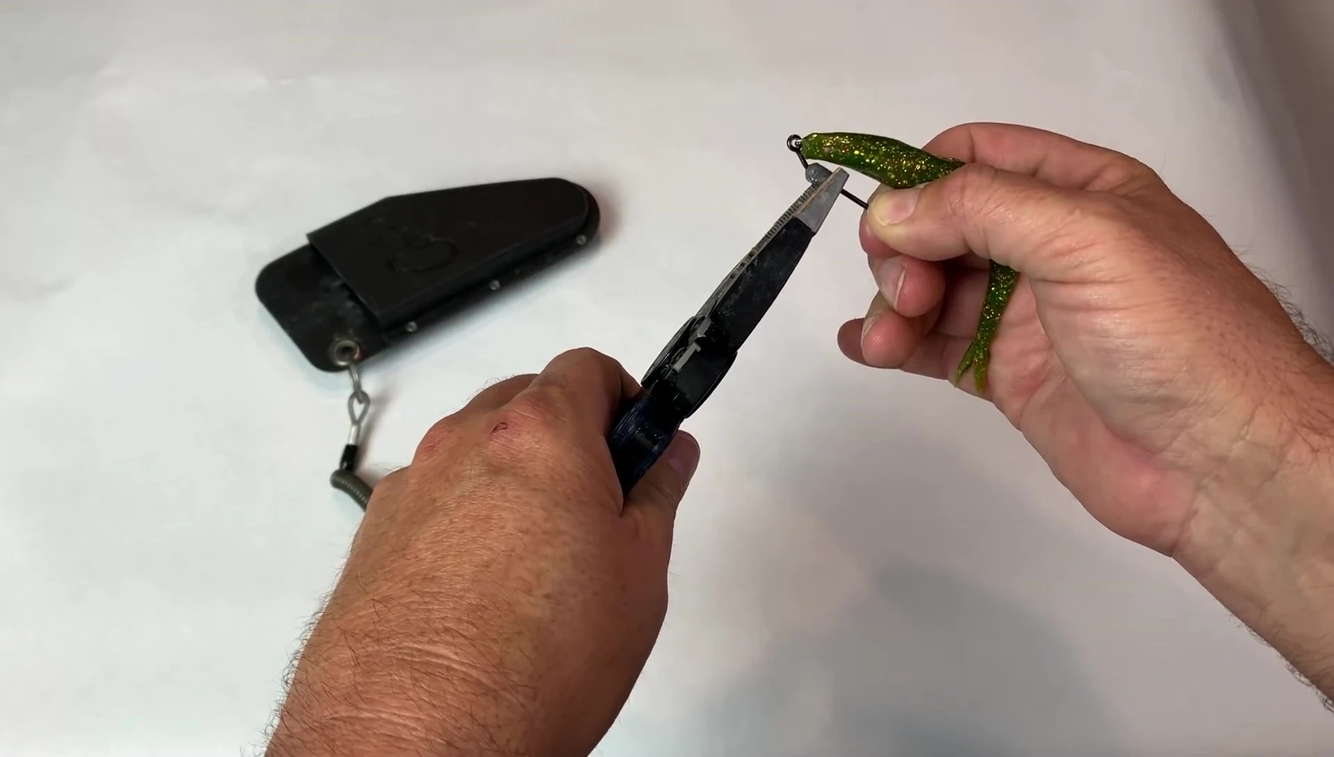 Relocating the weight on the hook.