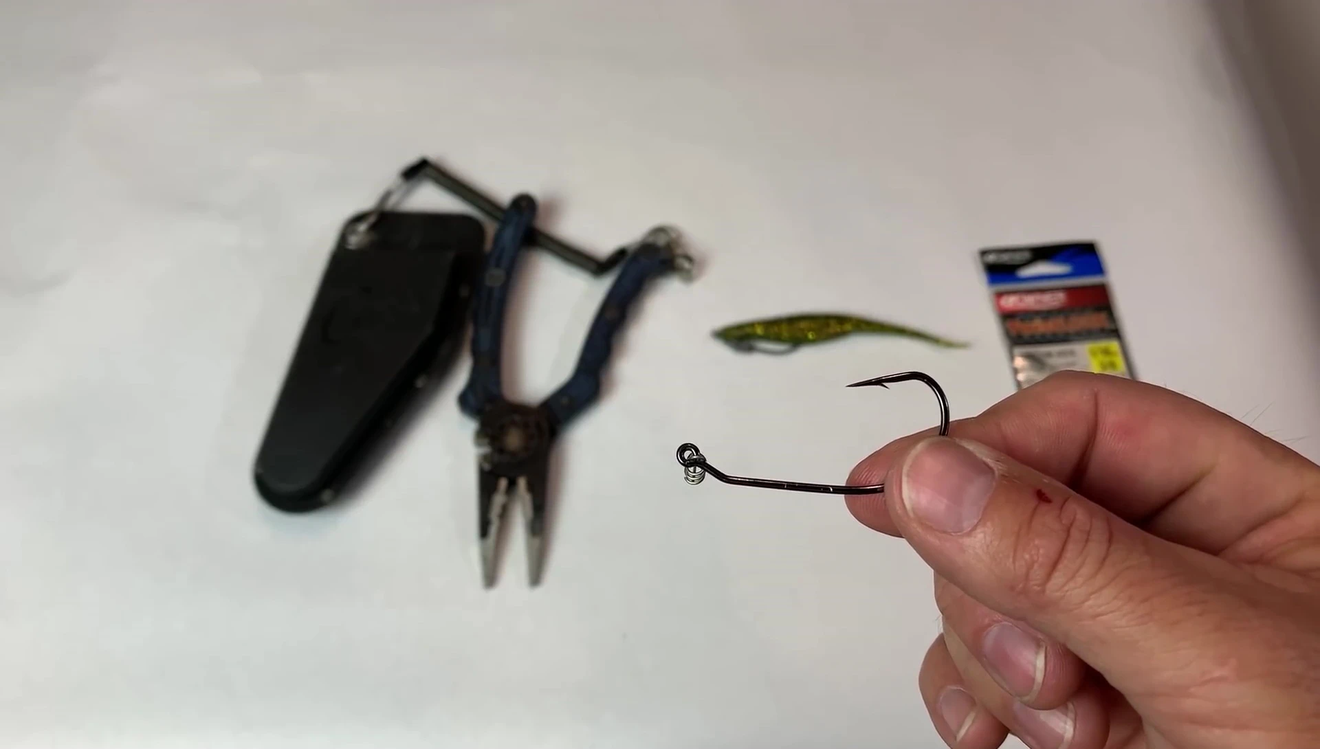 Removing the weight entirely from the hook.