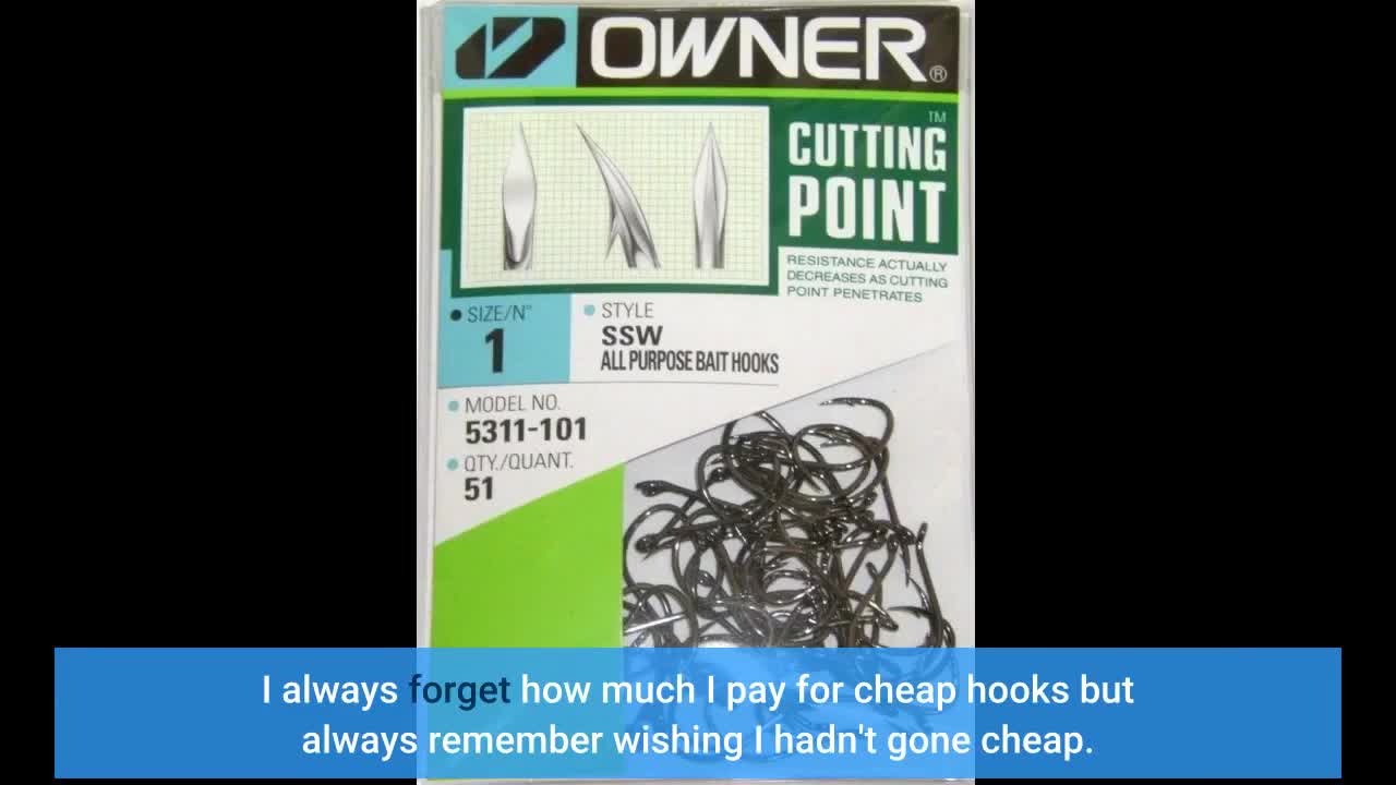 A hand holding several Owner hooks.