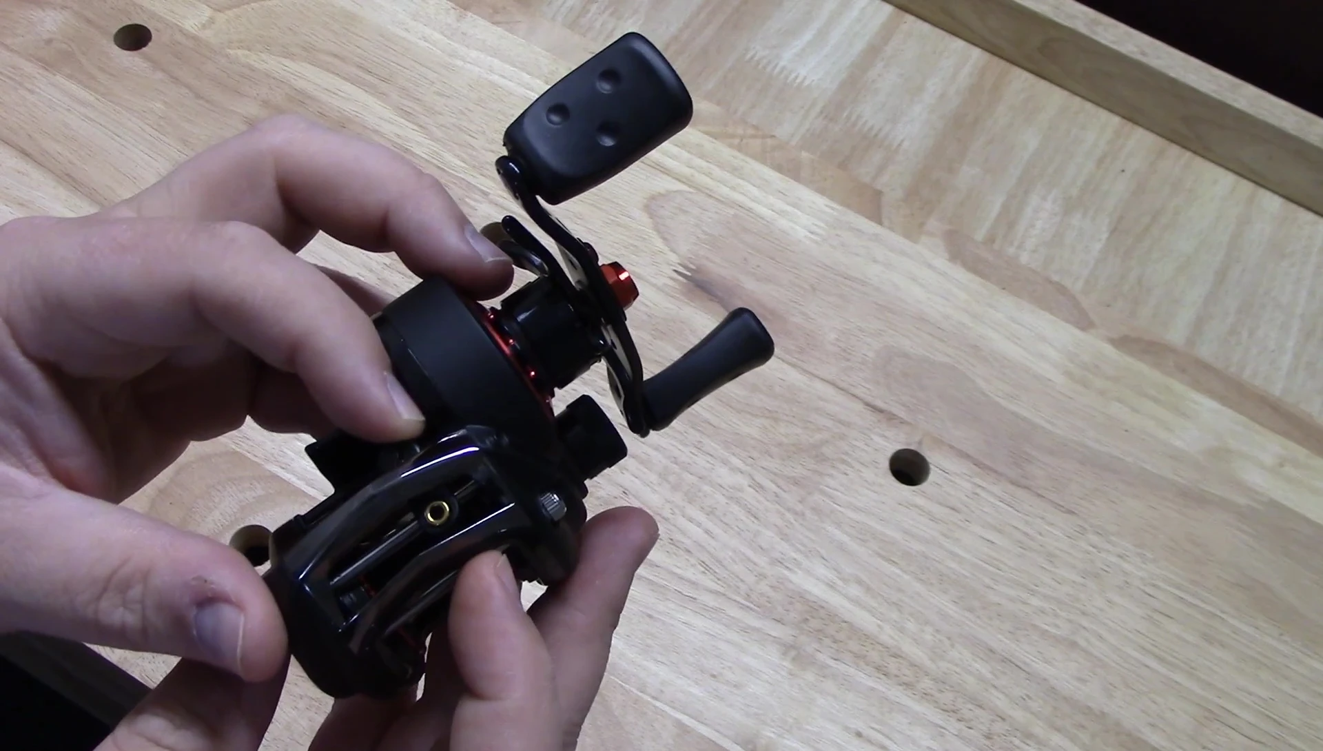 Close-up showing the excessive play in the line guide.