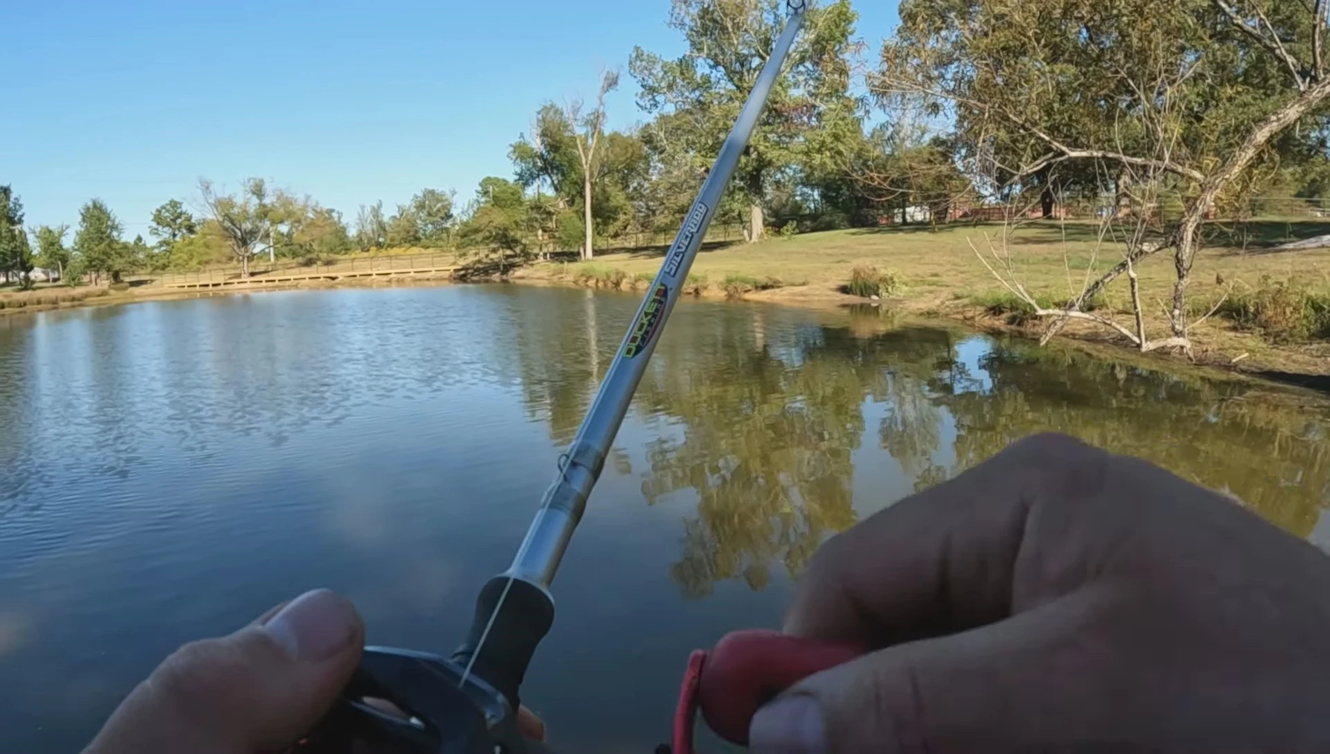 The reel paired with a Duckett fishing rod.