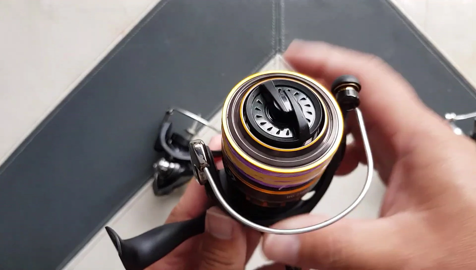 The speaker showing the bearing inside the Daiwa BG reel