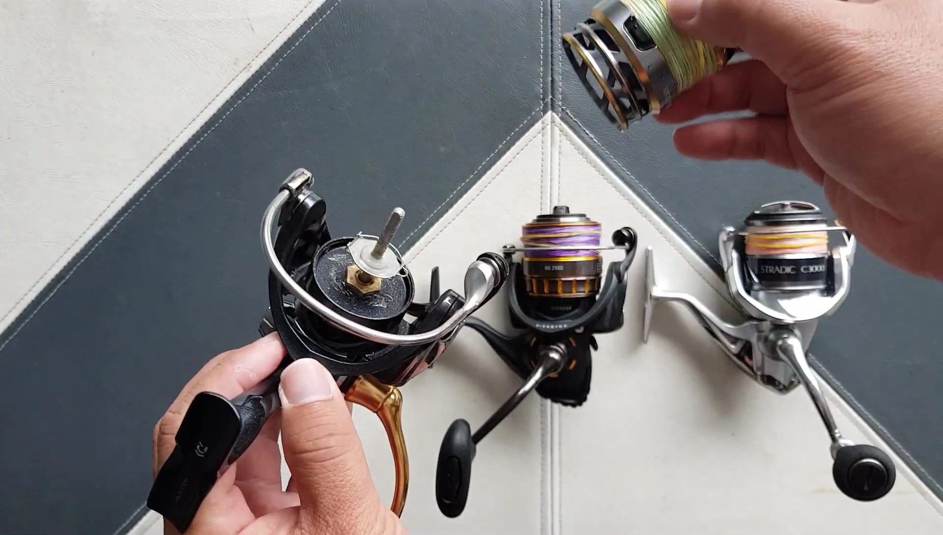 Comparison shot emphasizing the differences in the design of the Daiwa Exceler