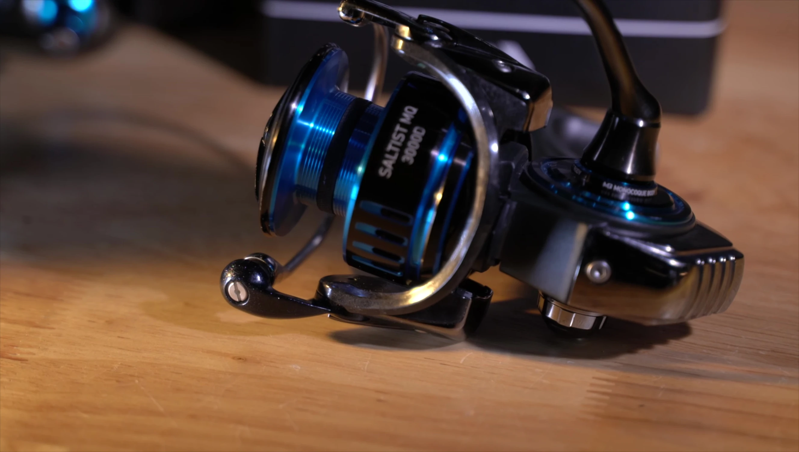 The 3000 size reel being used for fishing in shallow water