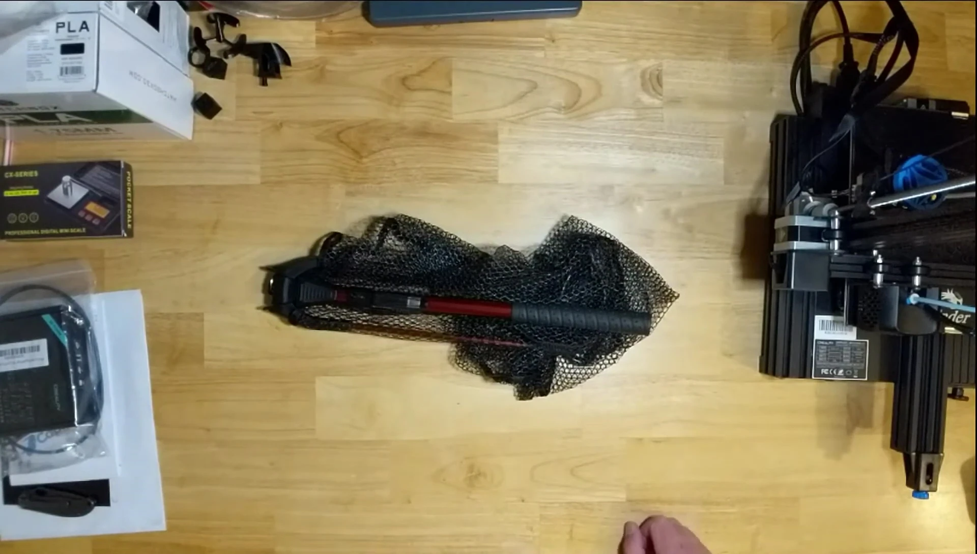 Overall shot of the net, highlighting its lightweight and compact nature.