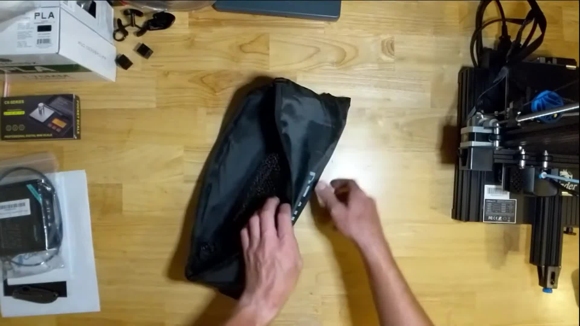 The FunVZU fishing net in its carrying case.