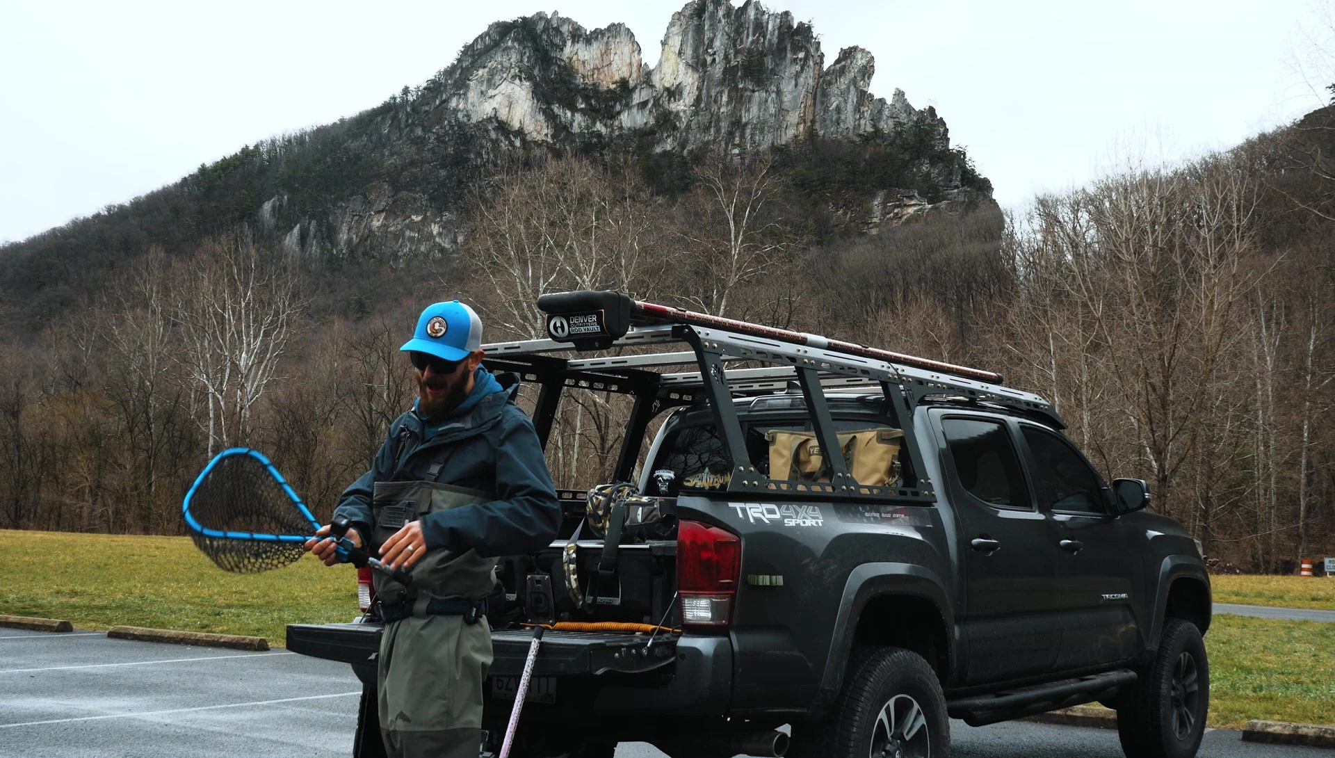 Demonstrating how the holster system securely attaches to the net and the belt/pack.