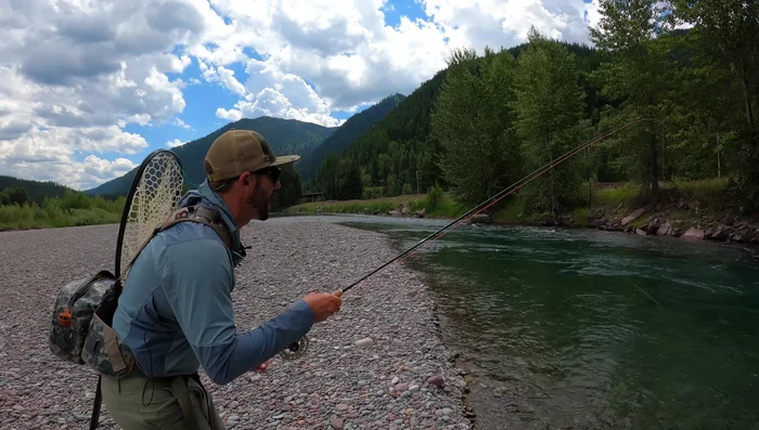 Cast your fly far upstream, avoiding disturbing the fish.