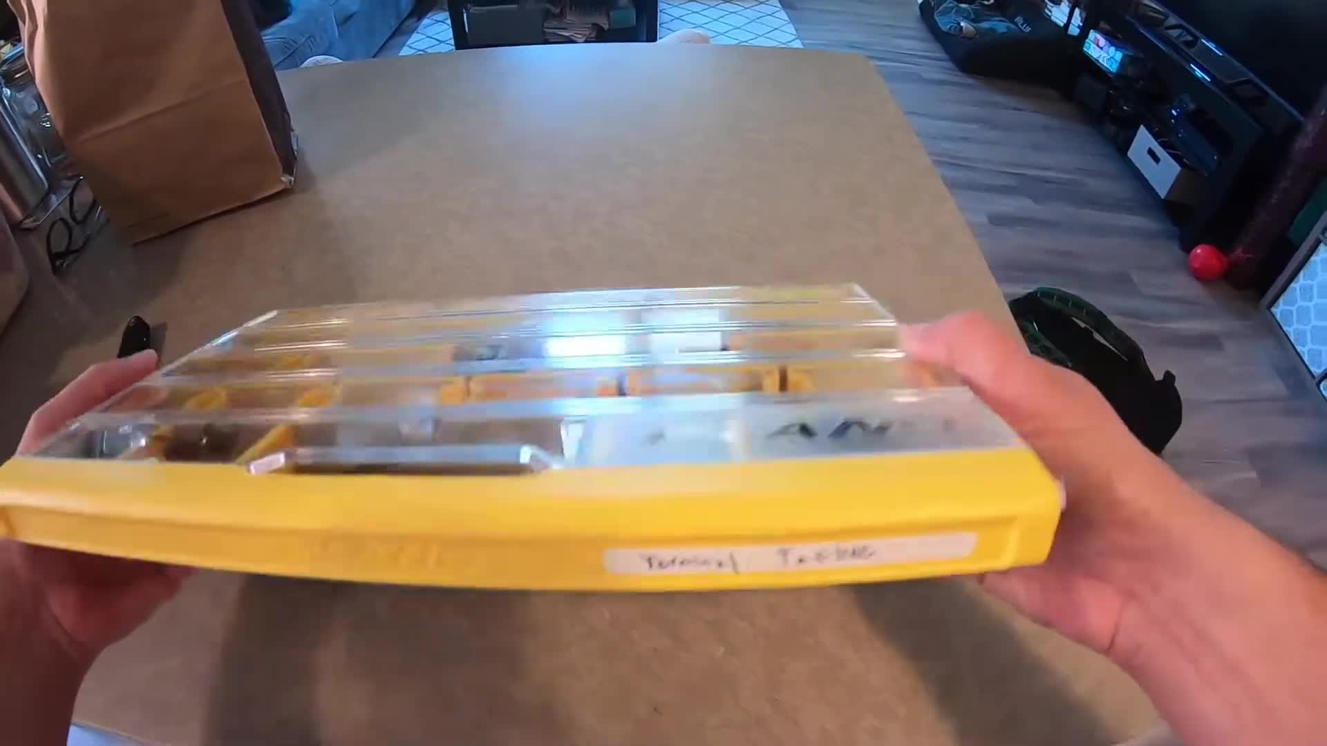 The Plano EDGE Terminal Tackle Box, already filled with various fishing tackle.