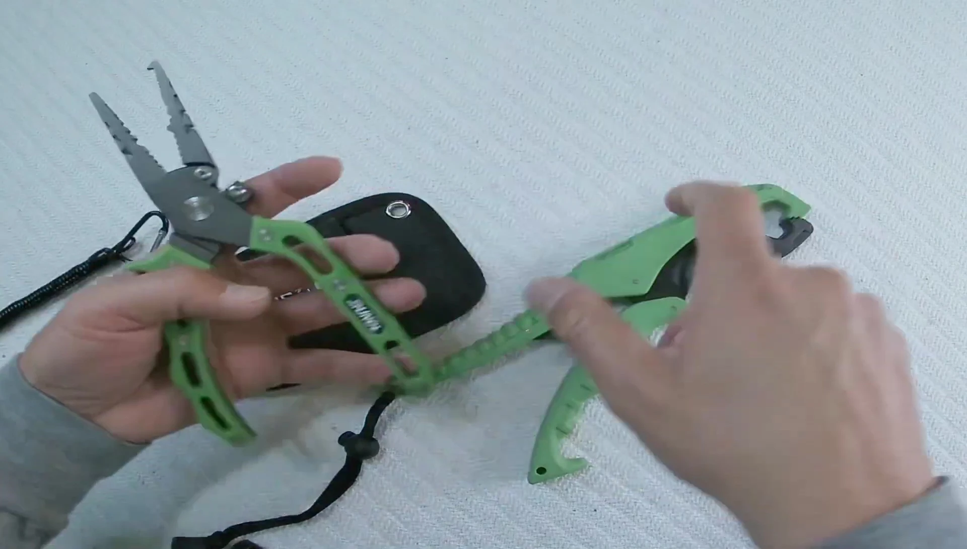 The pliers and lip gripper in their case