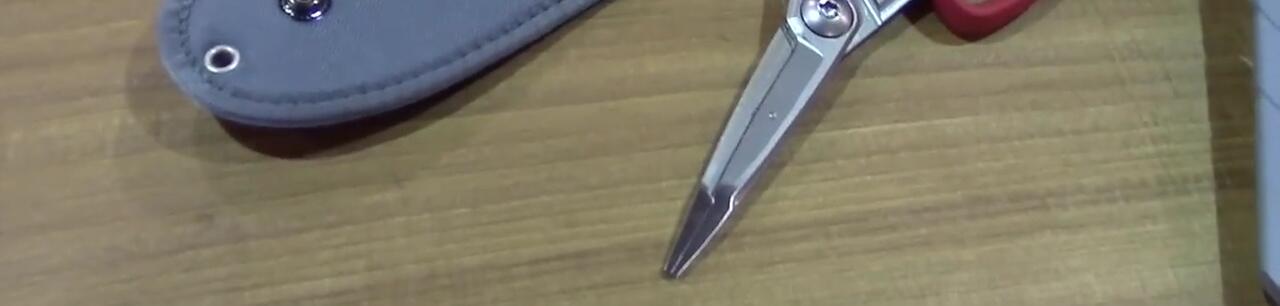 The presenter mentioning the MSRP of the bait knife